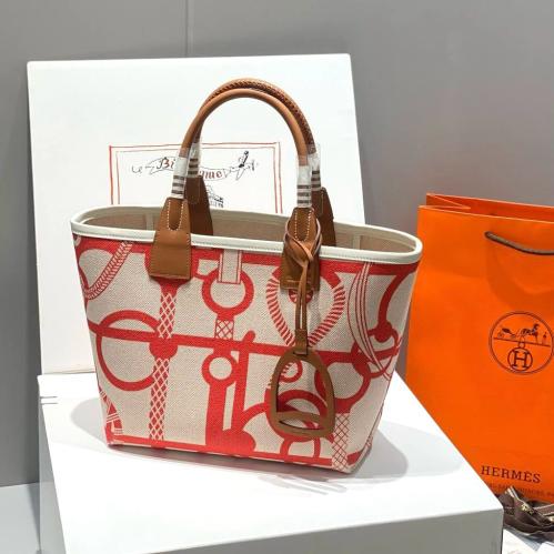 Hermes Stable 25 top handle bag in orange print E-SEVEN STORE