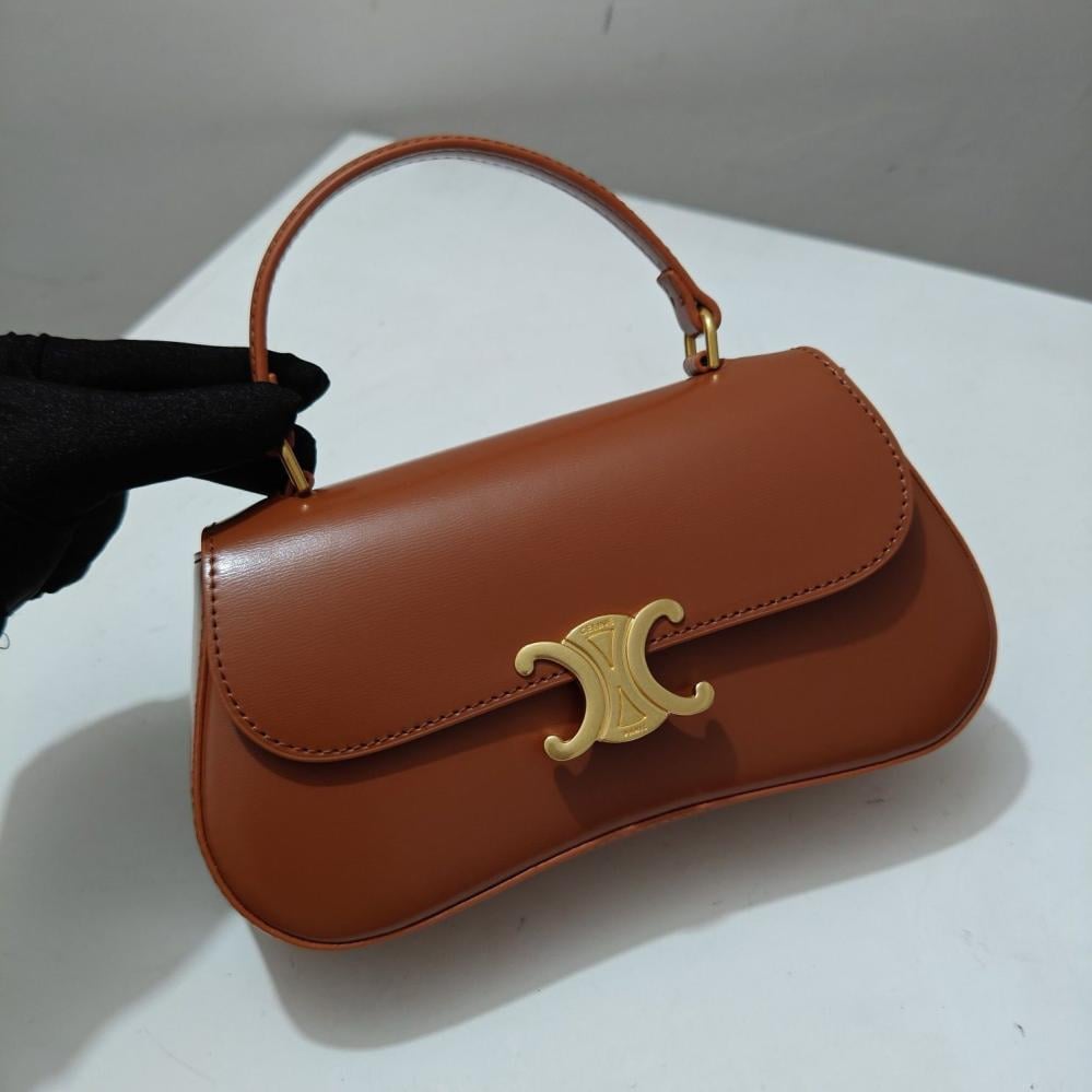 Classic Celine flap handbag in caramel color with gold logo