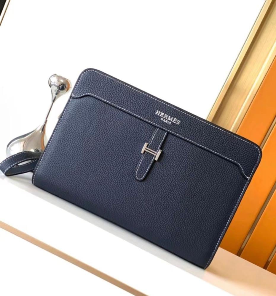 Hermes men's pouch bag, luxurious leather, navy blue color, with