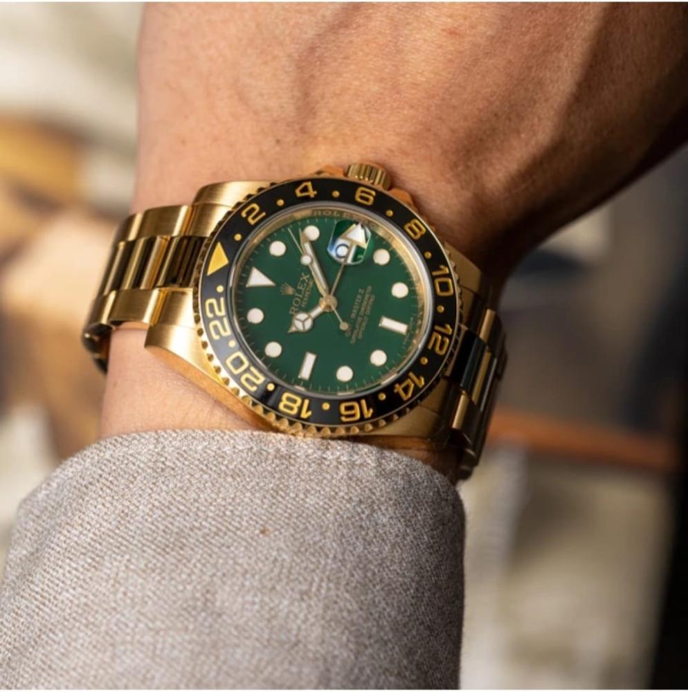 Rolex GMT-Master Gold Watch with Green Dial