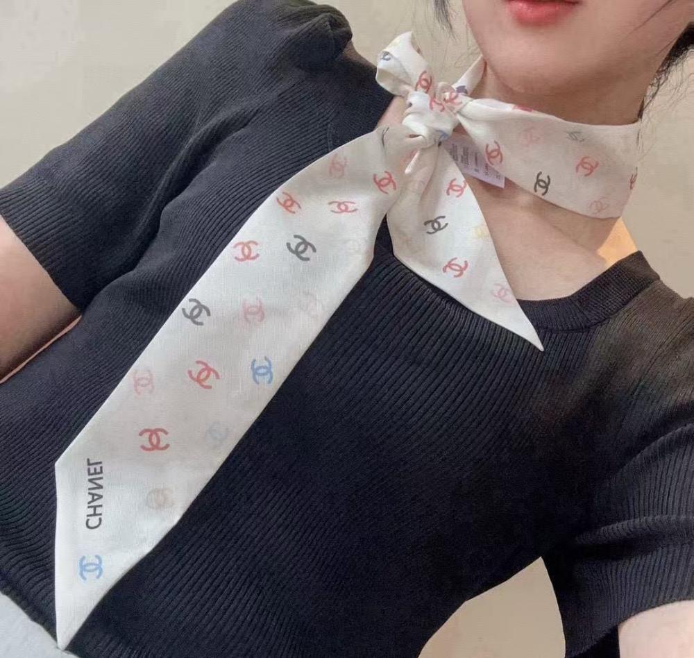 Short white Chanel scarf with colorful logos