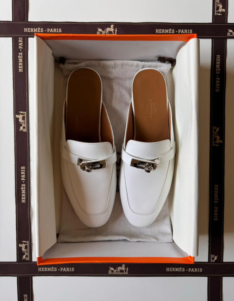 Hermes Kelly flat open shoes in elegant white color