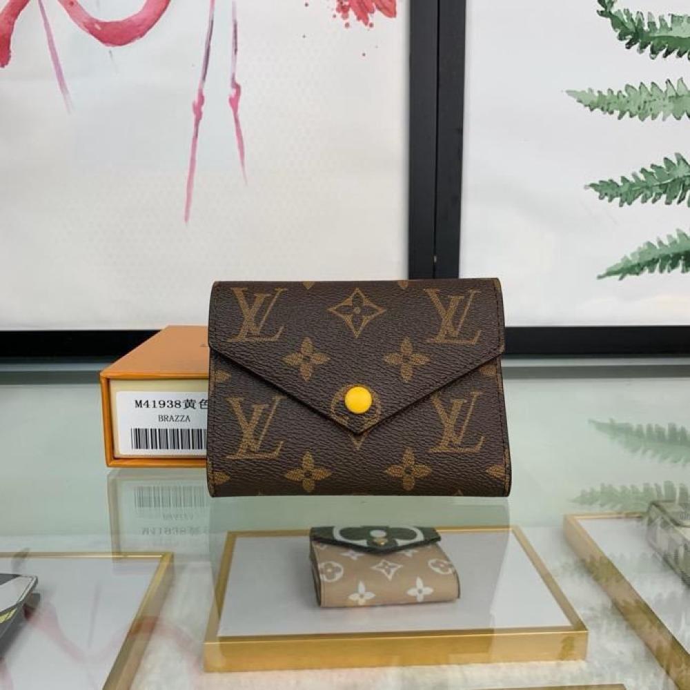Louis Vuitton Women's Small Monogram Leather Wallet in Brown E