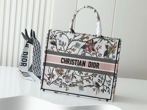 Mini Miu Miu bag with top handles in luxurious leather in silver
