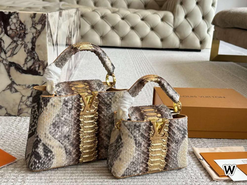Louis Vuitton Capucines bags in brown and gold snake-embossed leather
