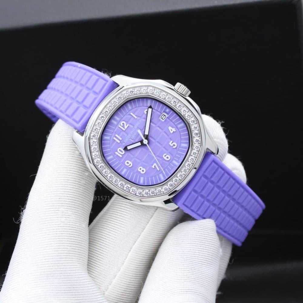 Stylish Patek Philippe Aquanaut watch, purple and silver, studded