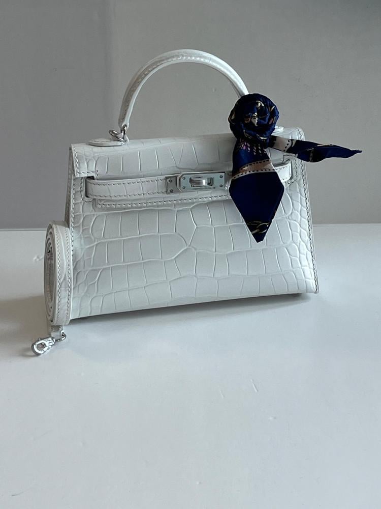 Hermes Kelly 19cm bag with white handles and strap