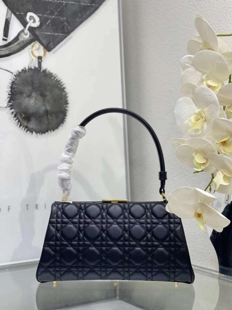 Dior women's bag, black, embossed leather, with a gold lock