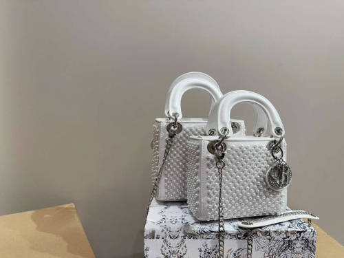 Christian Dior Lady Dior bag in white, adorned with white pearls