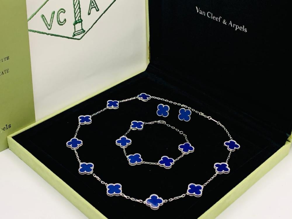 Van Cleef & Arpels Alhambra bracelet with navy blue necklace