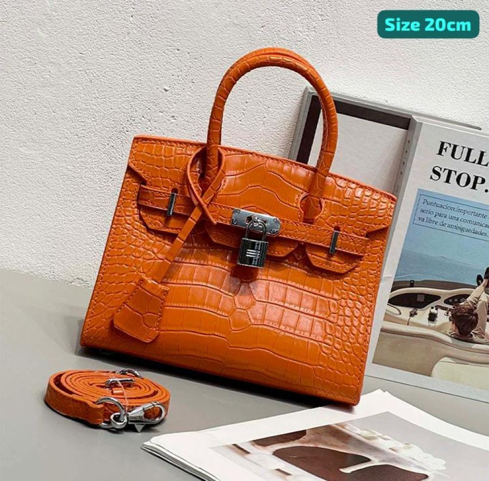 rie。 Hermes Birkin handbag in orange crocodile print - E-SEVEN STORE