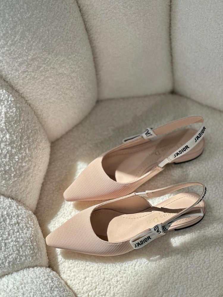 Dior women's elegant ballerina shoes in a distinctive beige color
