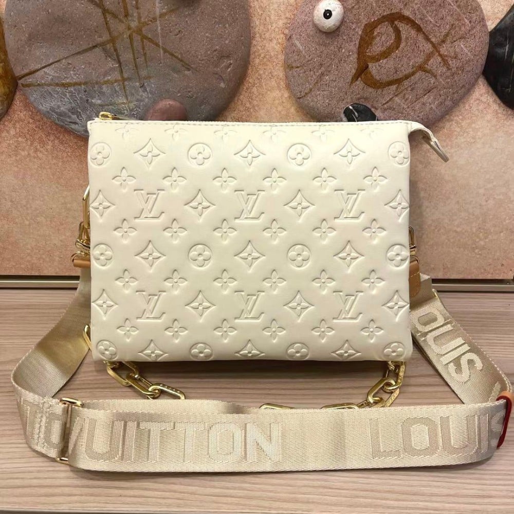 Louis Vuitton bag in sugar color with elegant engraved LV