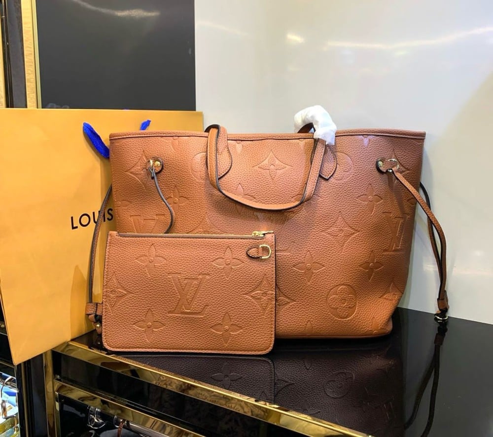 Louis Vuitton LV Neverfull empreinte bag in cognac brown monogram leather