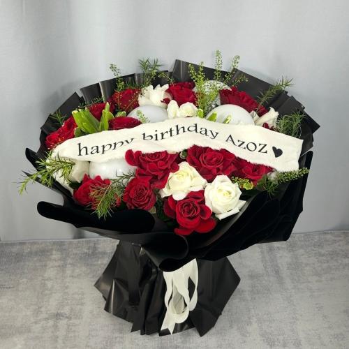 بوكيه مع شريطة عبارة