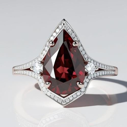 خاتم ذهب عيار ١٨  ٢جرام حجر جارنت طبيعي والماس