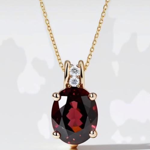 تعليقة ذهب عيار ١٨ ١.٣ جرام مع حجر جارنت طبيعي والماس