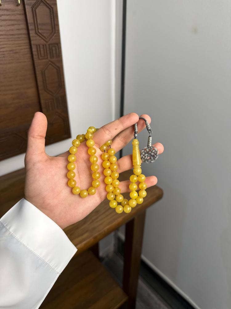 مسباح بكلايت اصفر شفاف