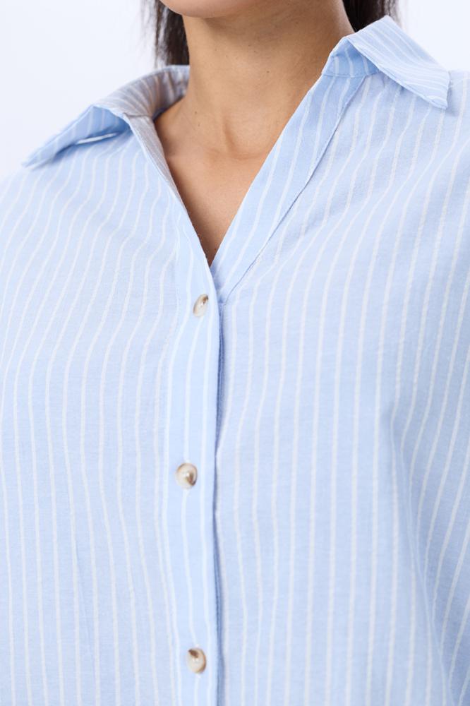 بلوزة سماوي مقلم