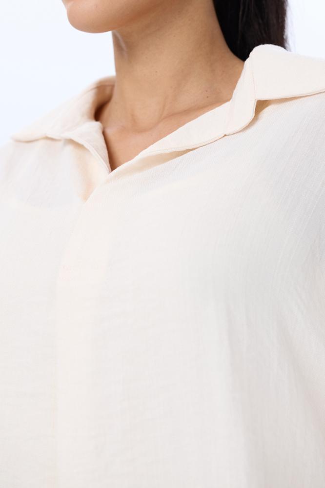 بلوزة كتان أوف وايت بأكمام واسعة