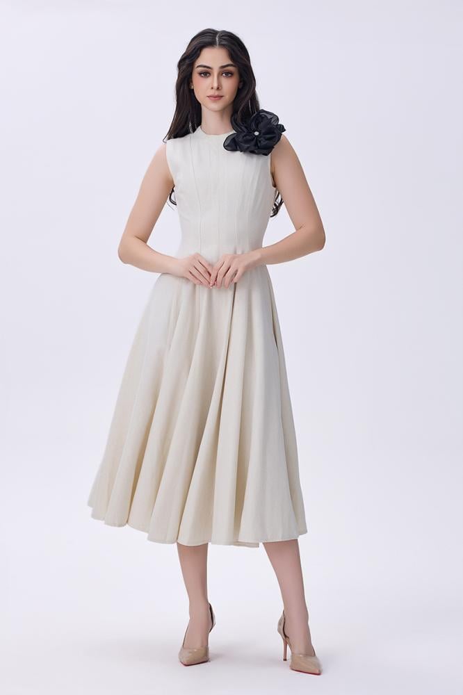 فستان بيج أنيق بدون أكمام