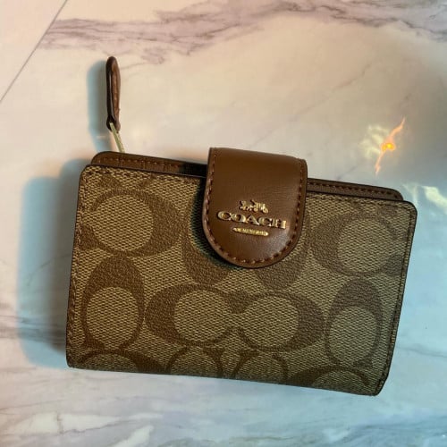 محفظة coach