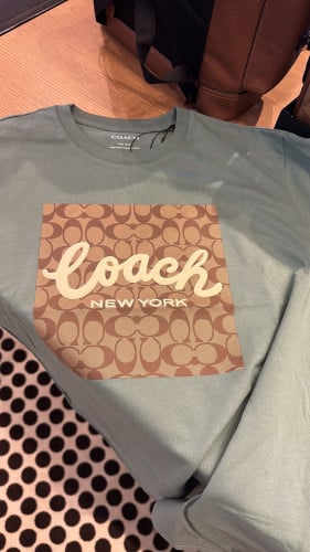 بلوزة coach رجالي