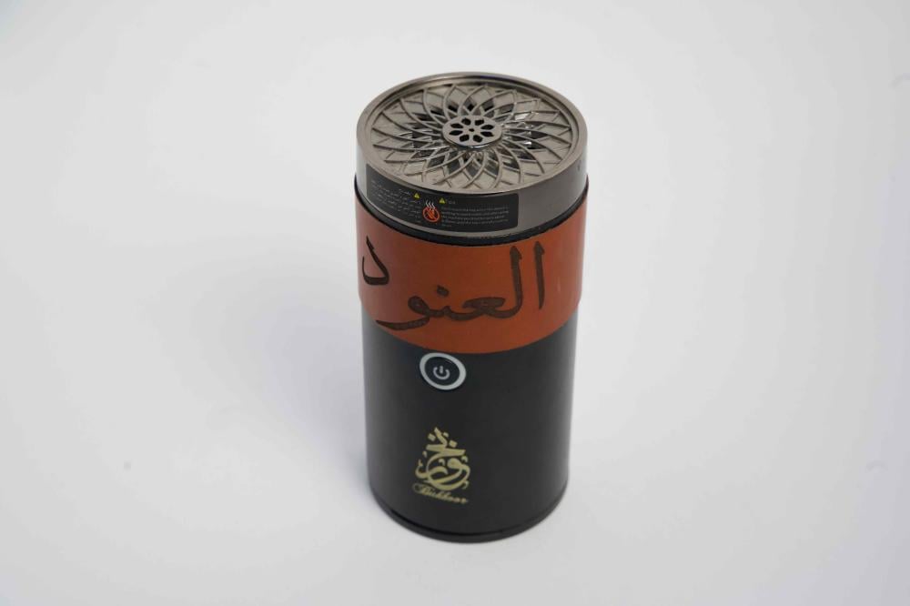 مبخرة اسطوانية مع الجلد والكتابة