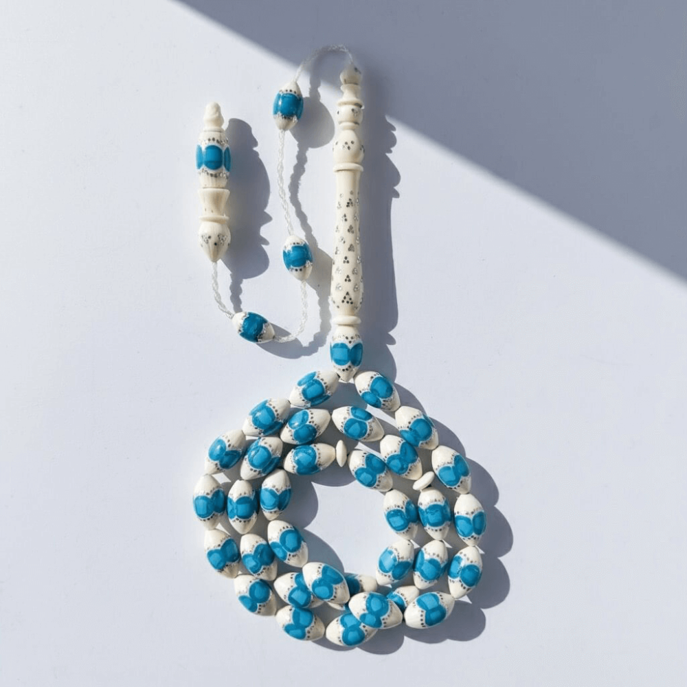 سبحة فاخرة من عاج ناب الفيل مطعم فضة و فيروز طبيعي - 7 ملي 33 خرزة