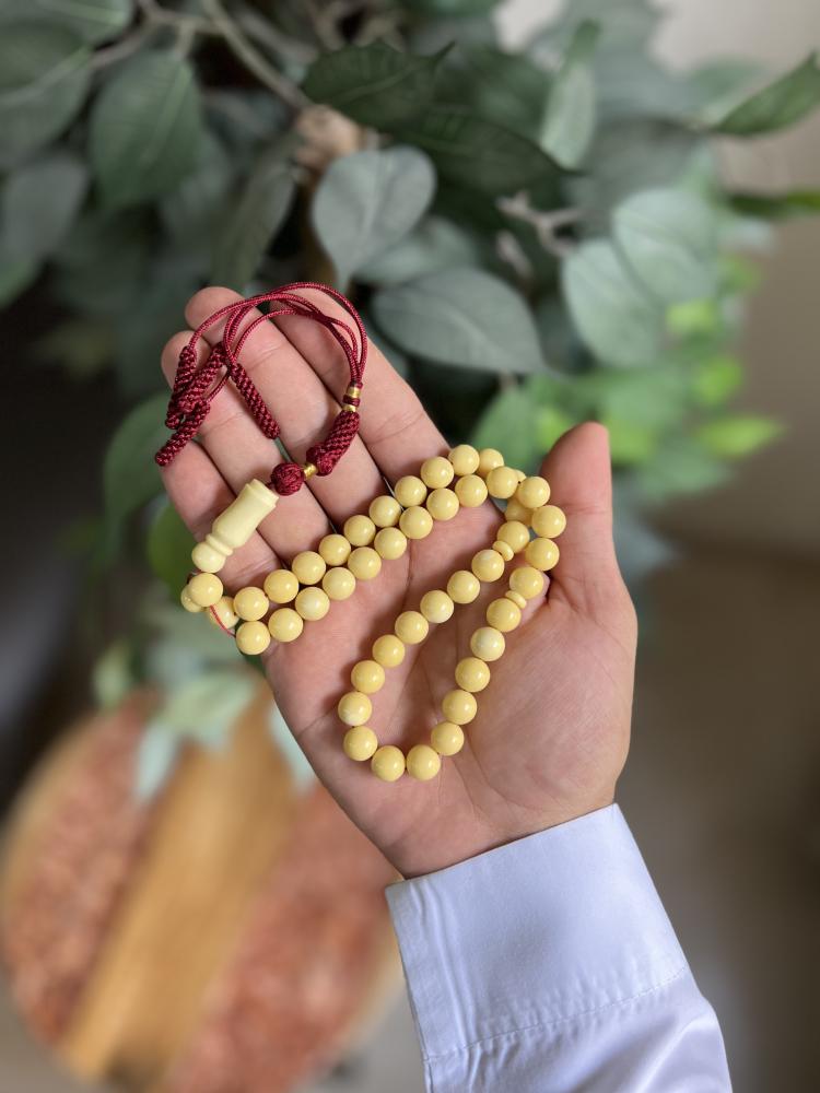 مسابح تراب الكهرمان شكة قماش