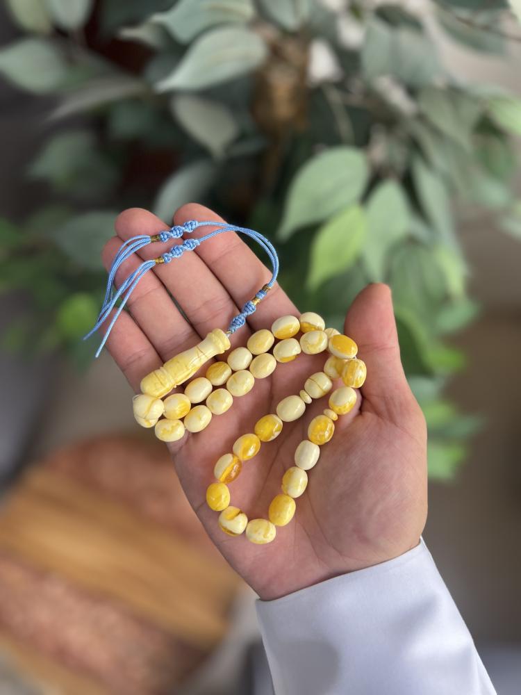 مسابح تراب الكهرمان شكة قماش