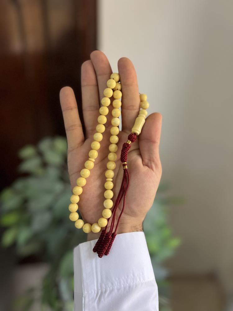 مسابح تراب الكهرمان شكة قماش