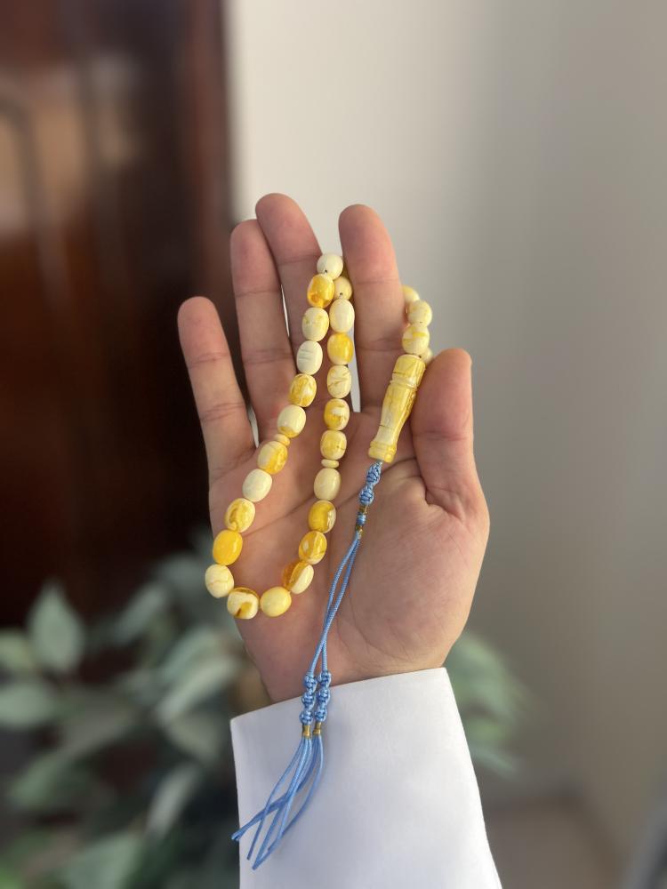 مسابح تراب الكهرمان شكة قماش