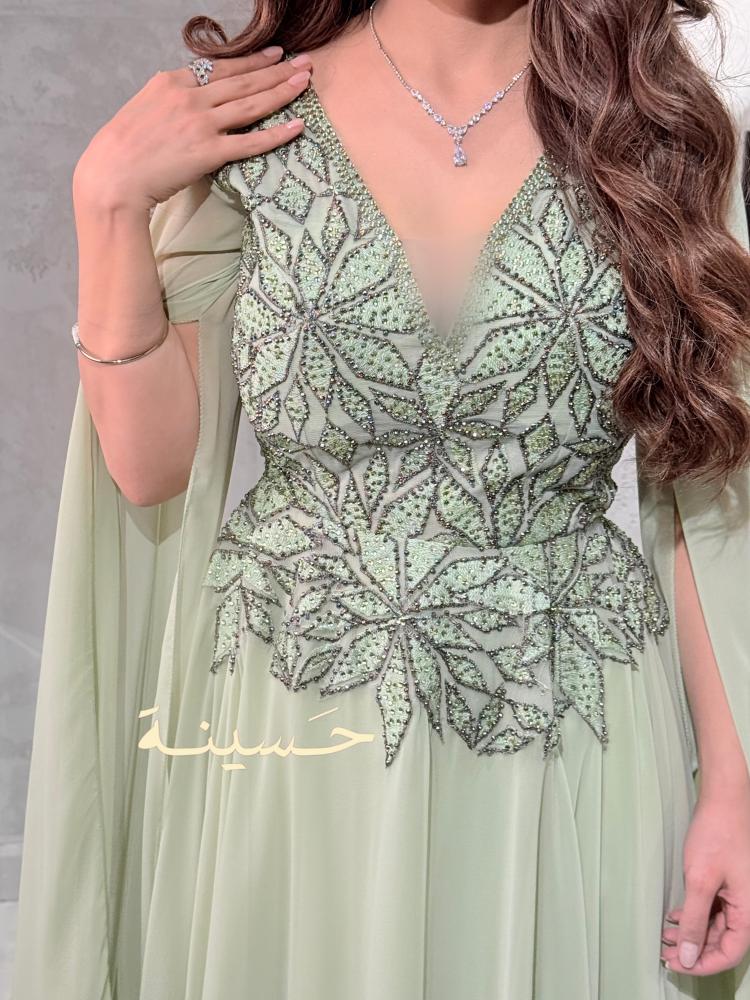 Elegant light green evening dress
