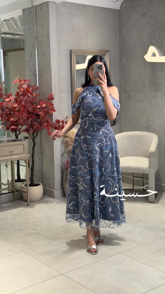Elegant dark blue set with swirled embroidery