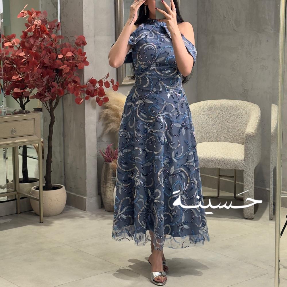 Elegant dark blue set with swirled embroidery