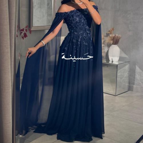 فستان سهرة ملكي بتصميم أوف شولدر أنيق،