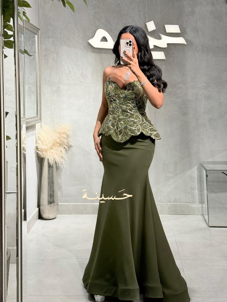 فستان زيتي مطرز بتصميم كورسيه فاخر
