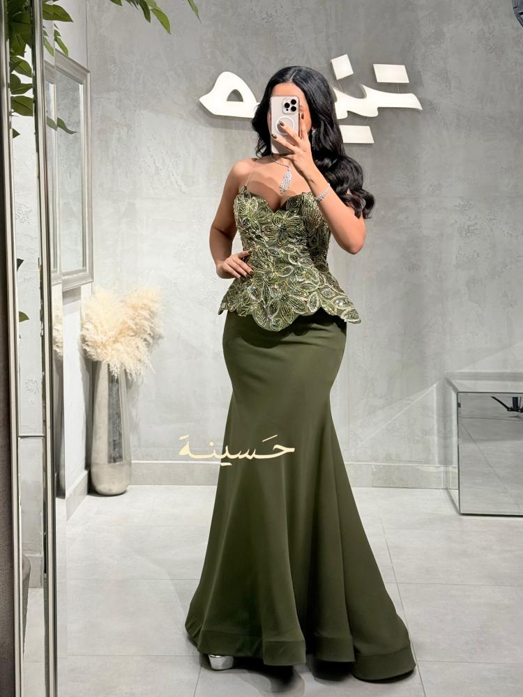 فستان زيتي مطرز بتصميم كورسيه فاخر