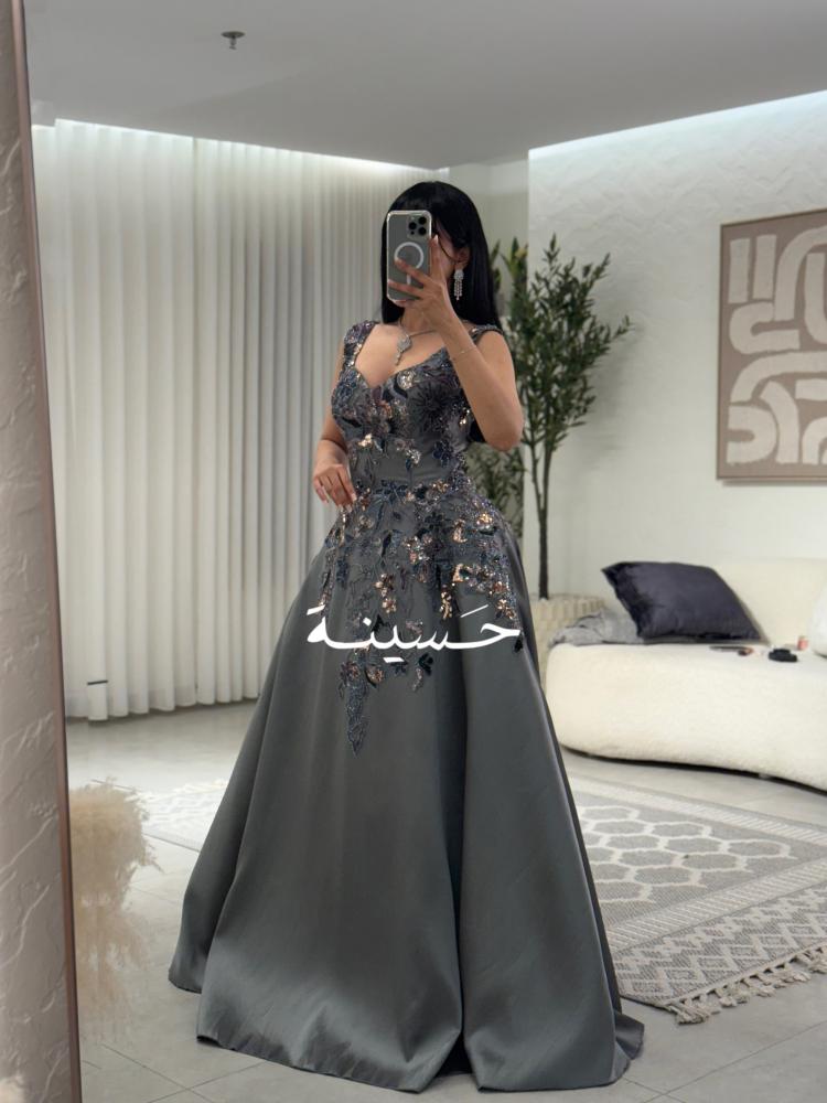 Long embroidered gray evening dress