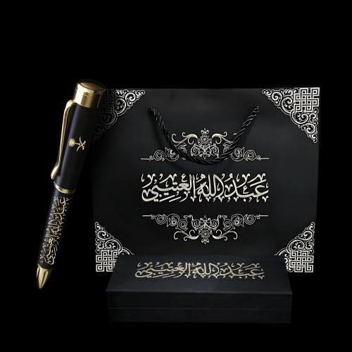 قلم ذهبي اسود مع نحت الإسم