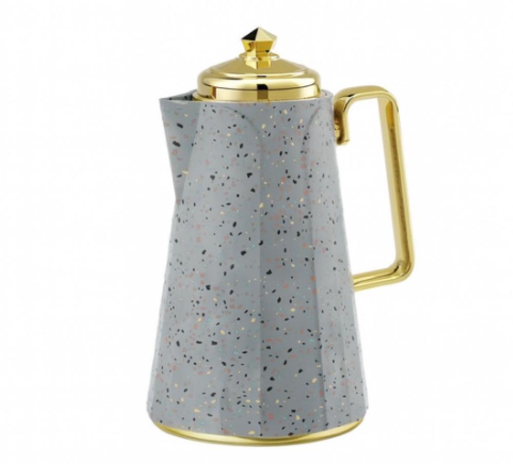 ترمس شاي رمادي منقط من الأسطورة أناقة الضيافة السعودية ولمسة فخامة تدو