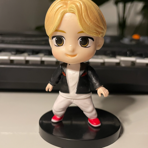 Tiny tan figure jimin