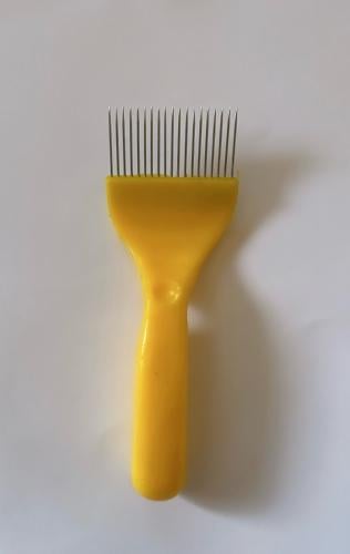 أداة كشط العسل