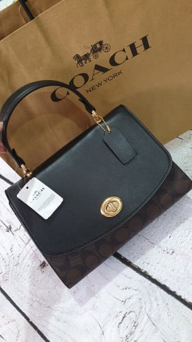 شنطة ماركة كوتش