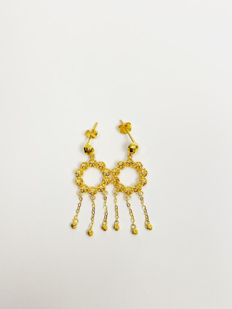 Oriental gold embellished earring - elegant heritage design.