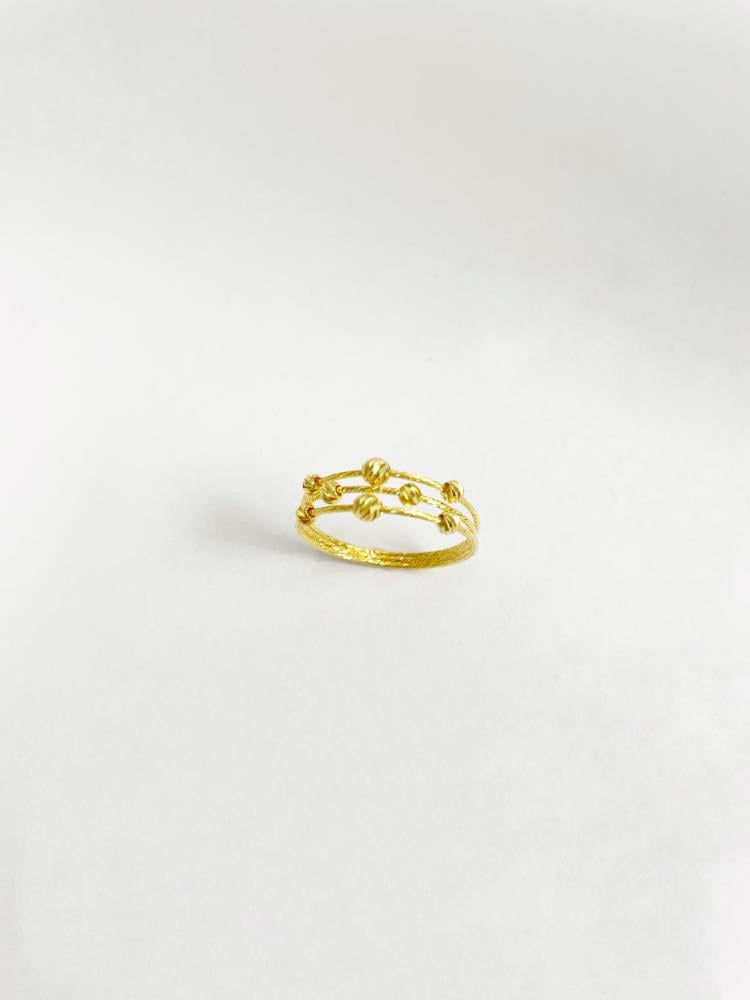 21k rose gold ring - delicate feminine design.