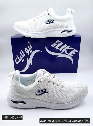 حذاء رياضي ابيض و اسود ماركة نيولايك