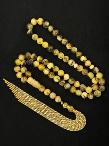 سبحة كهرمان طبيعي شوائب