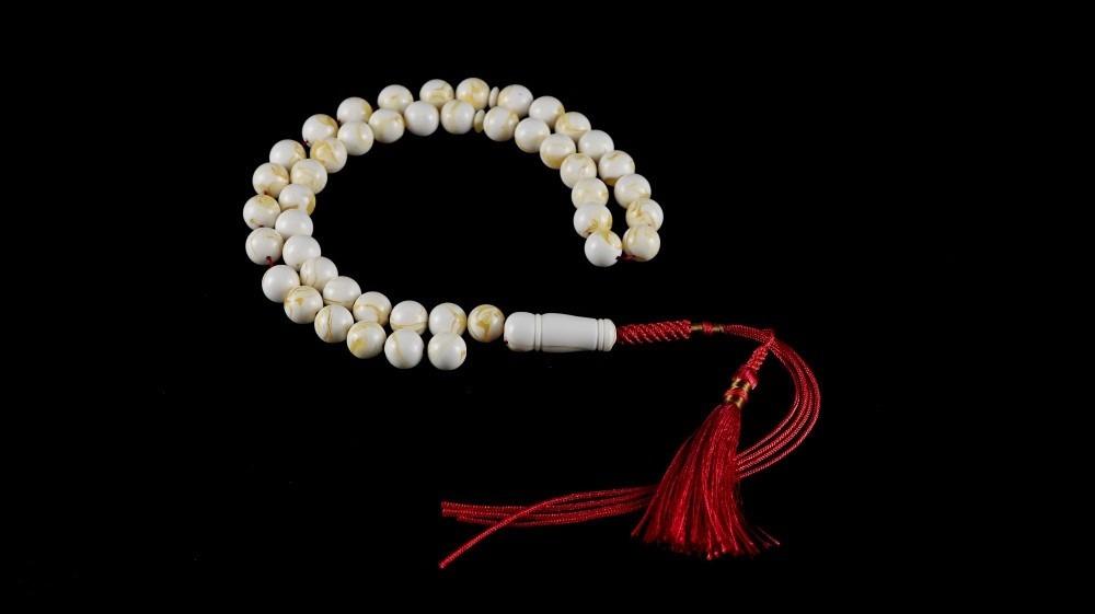 Original rosary made of gypsum and honey